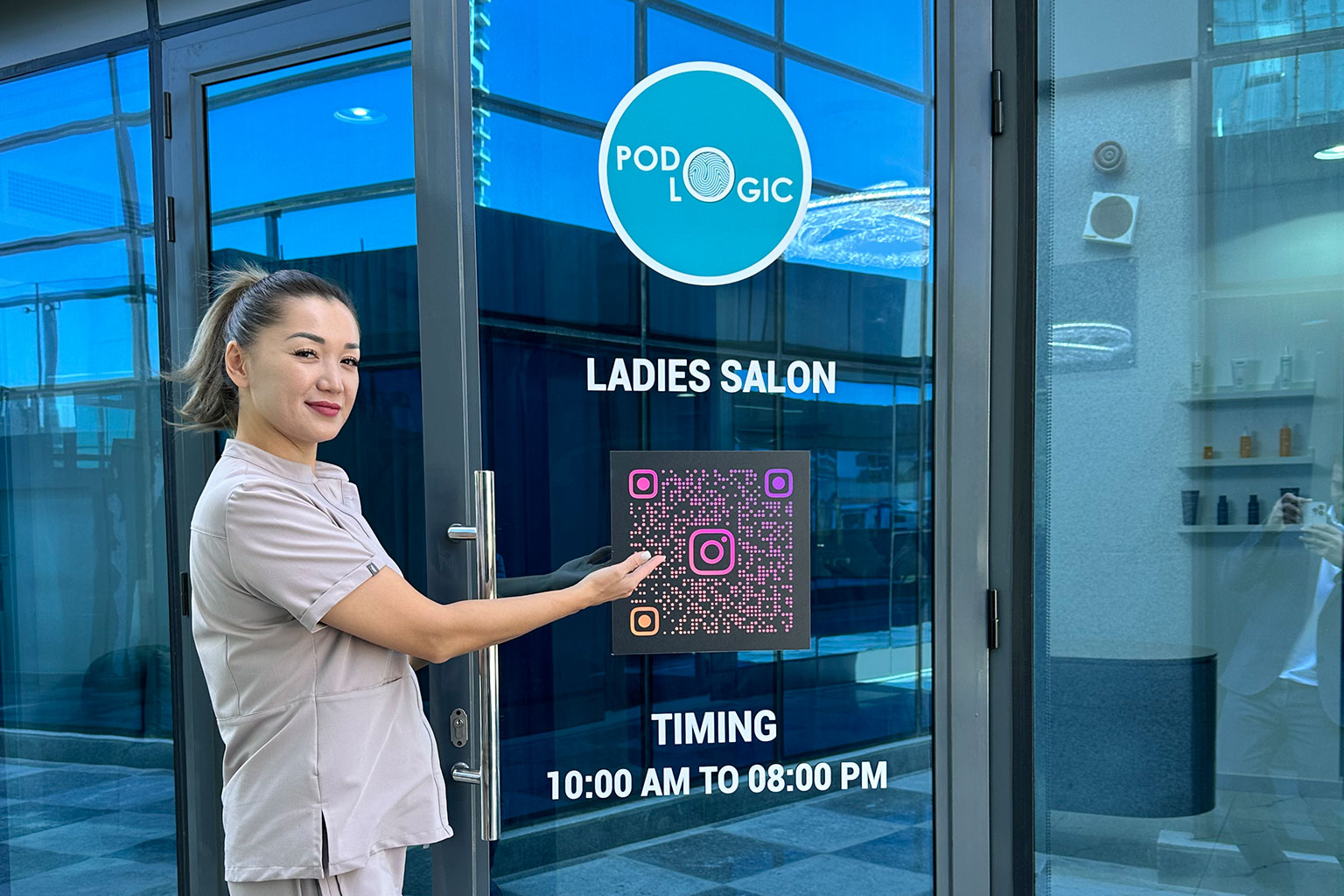 PodoLogic cosmetic podology specialist caring for a client's feet
